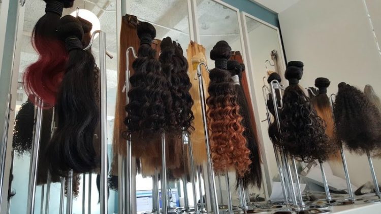 various hair samples on hair stands 